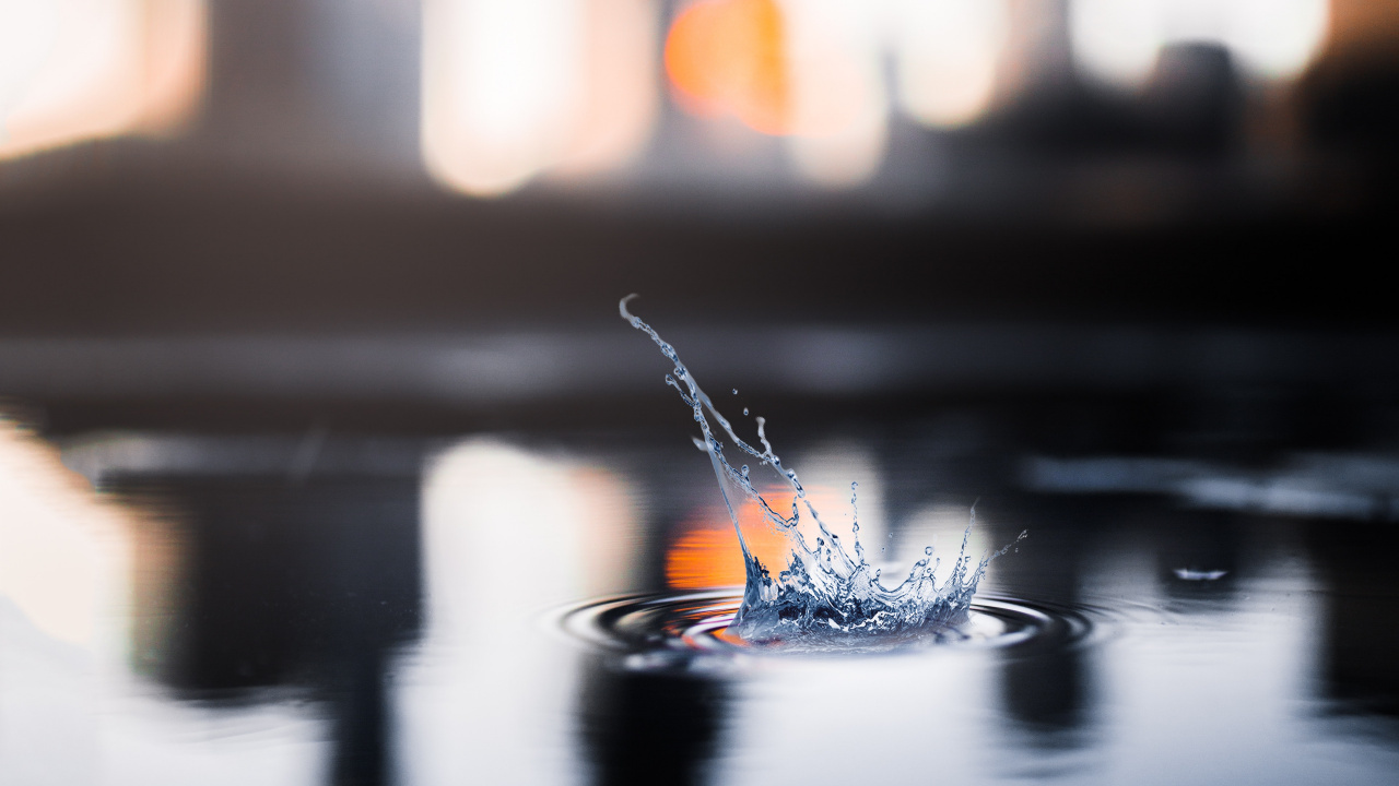 Обои стекло, Апельсин, вода, небо, город в разрешении 1280x720