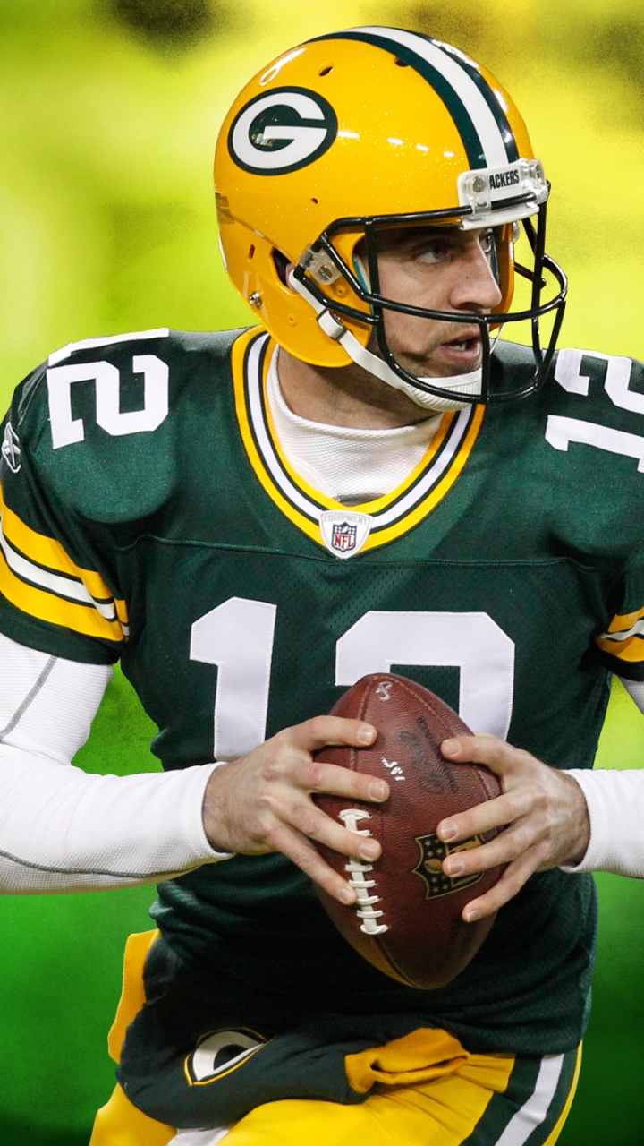 Обои Грин Бэй пэкерз, футбольное поле футбол, командный вид спорта, спортсмен, футбольный шлем в разрешении 720x1280