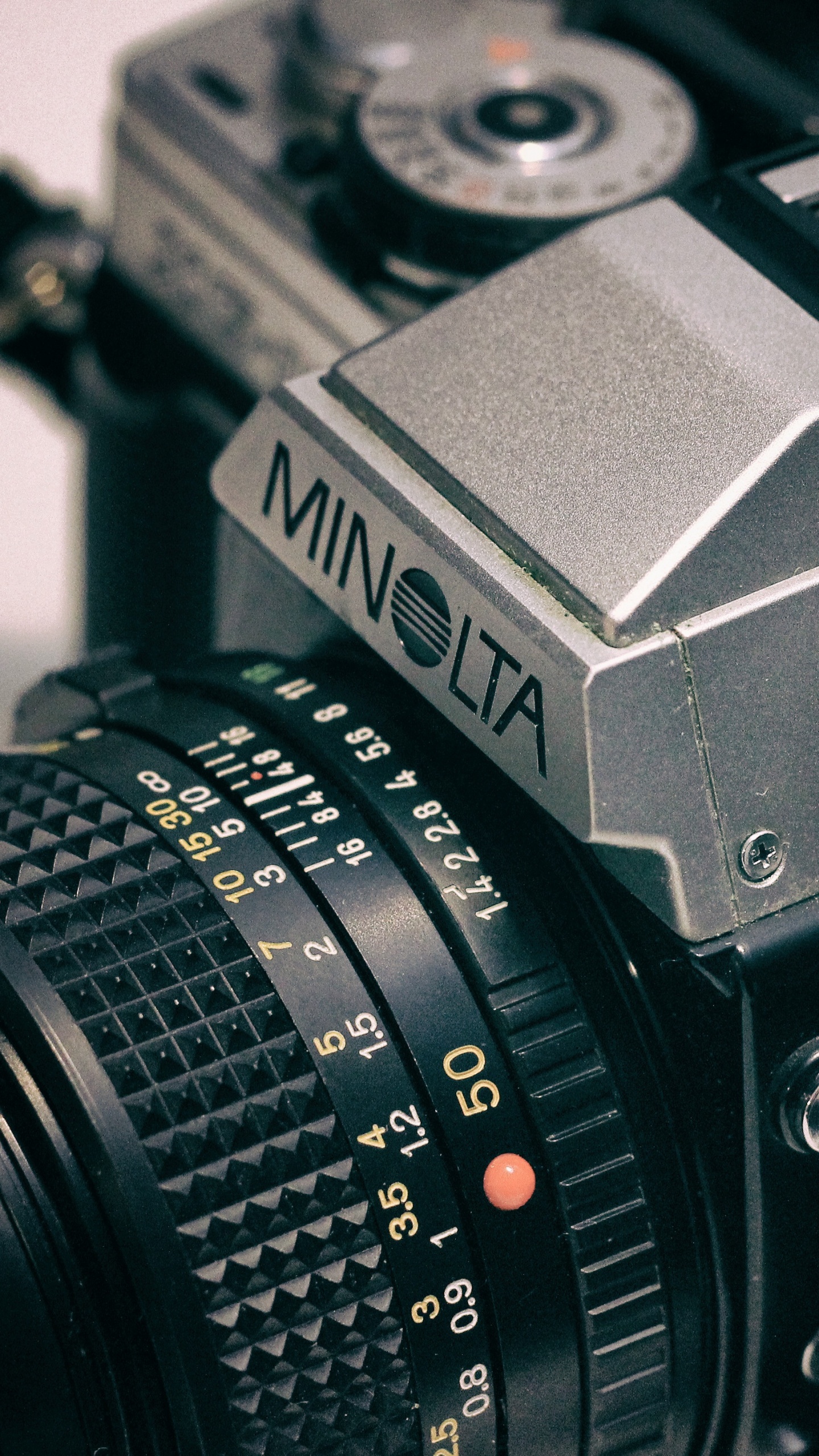Обои камера, цифровые зеркальные, объектив камеры, компания Minolta, аксессуары для камеры в разрешении 1440x2560