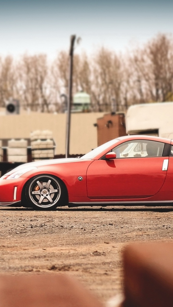 Обои Ниссан, авто, спорткар, колесо, завод в разрешении 720x1280