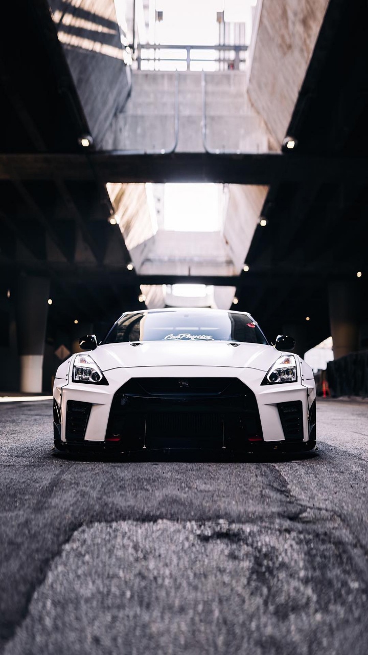 Обои колесо, спорткар, легковые автомобили, автомобильное освещение, капюшон в разрешении 720x1280