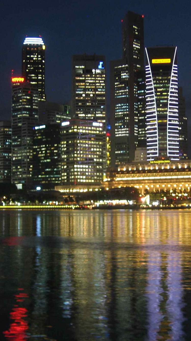 Обои город, ночь, городской пейзаж, метрополия, отражение в разрешении 750x1334