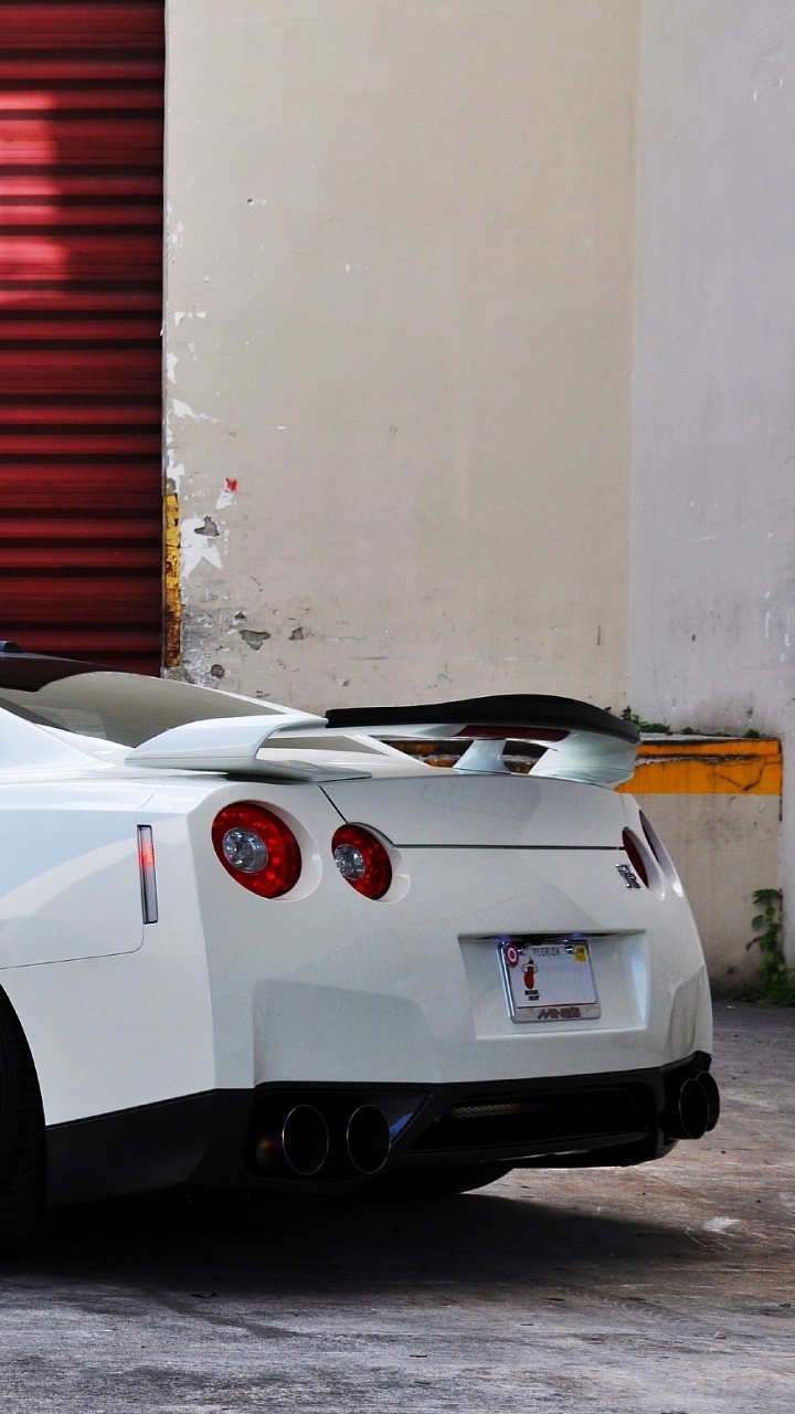 Обои авто, Ниссан, колесо, суперкар, белые в разрешении 720x1280