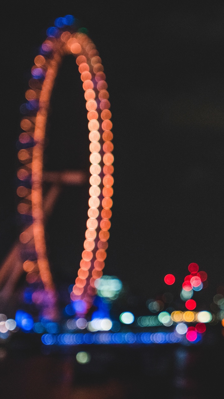 Обои колесо обозрения, ночь, ориентир, свет, городской район в разрешении 720x1280