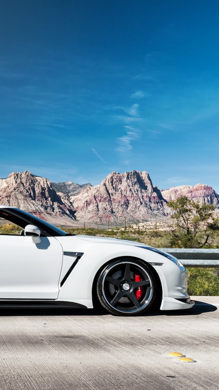 Обои авто, Ниссан, спорткар, суперкар, белые в разрешении 720x1280