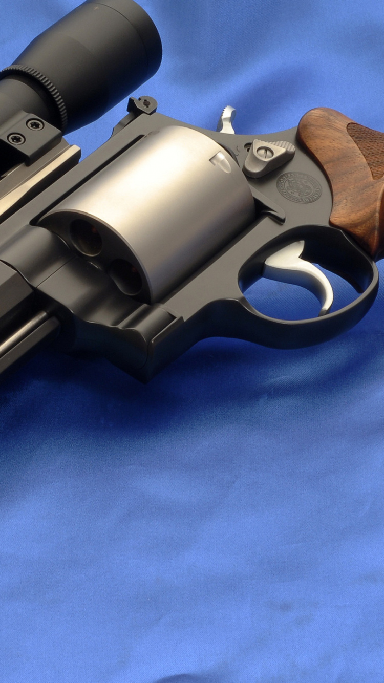 Обои орудие, огнестрельное оружие, триггер, револьвер, пневматическое оружие в разрешении 750x1334
