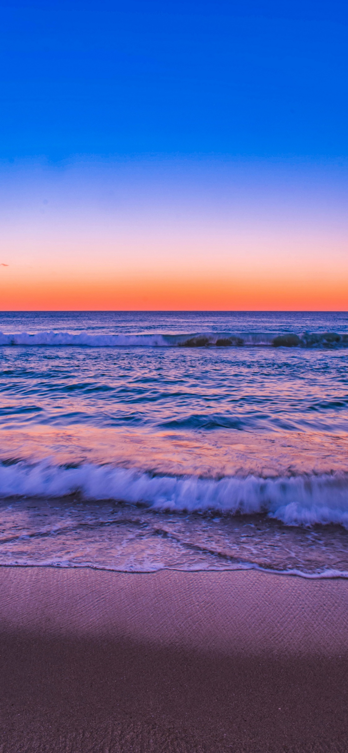 Обои закат, море, пляж, побережье, горизонт в разрешении 1125x2436