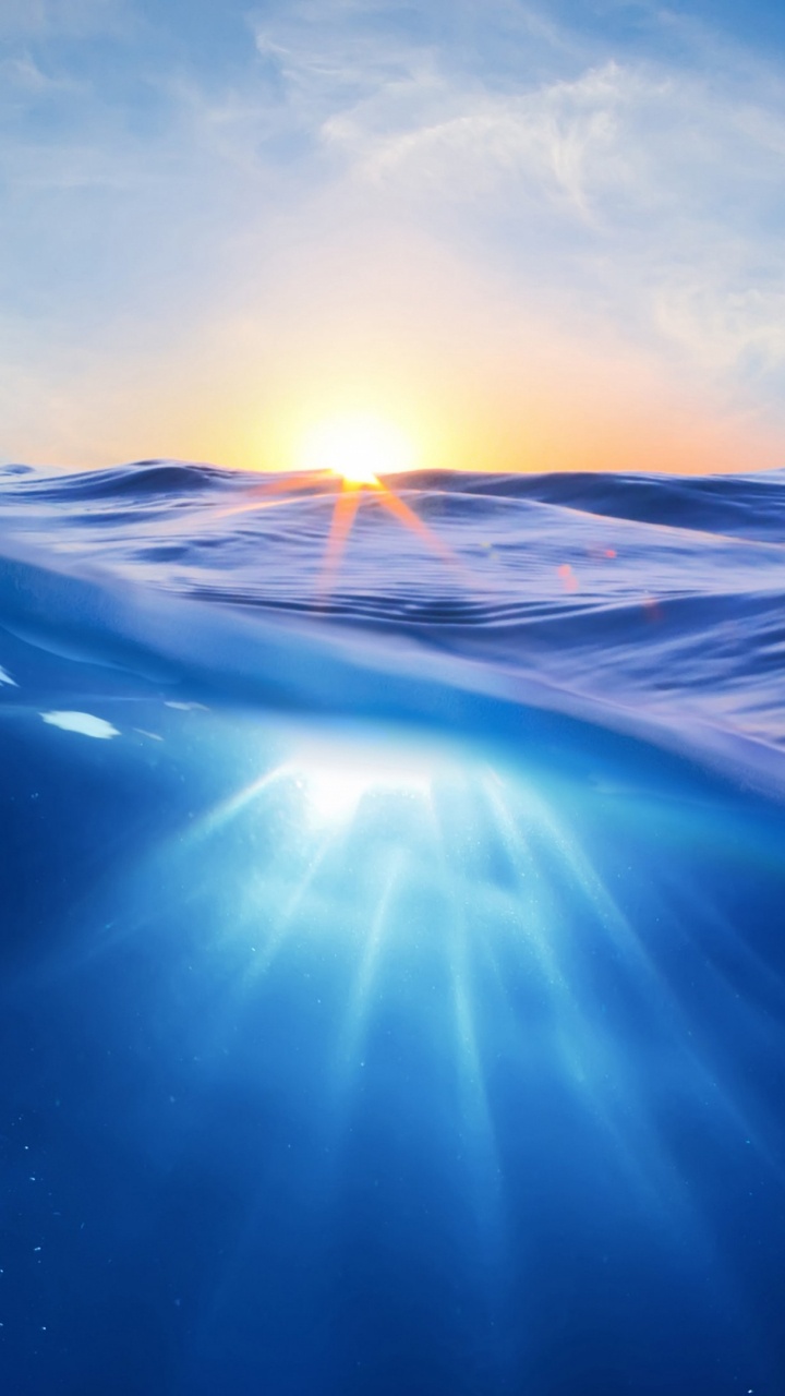 Обои вода, океан, море, солнечный свет, волна в разрешении 720x1280