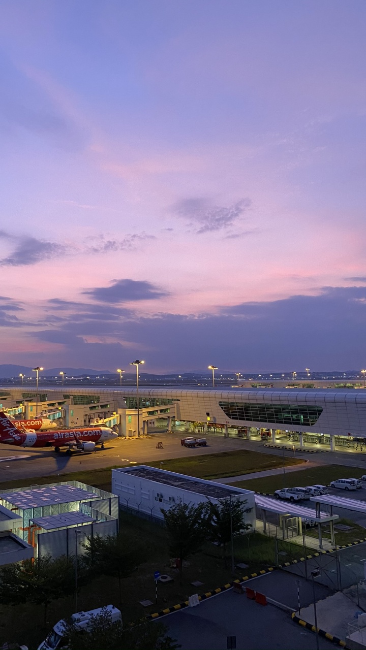 Обои сумрак, горизонт, городской район, город, вечер в разрешении 720x1280