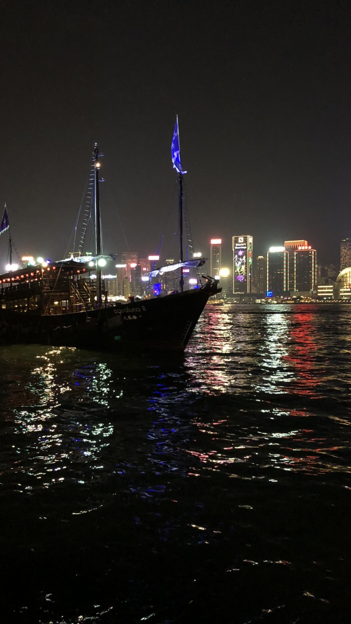 Обои Гонконг, отражение, вода, ночь, город в разрешении 720x1280