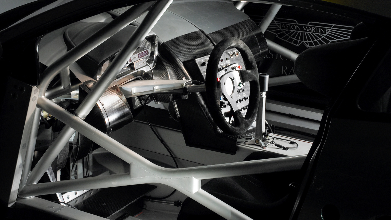 Обои Астон Мартин dbr9, Астон Мартин, суперкар, рулевое колесо, Астон Мартин дбс в разрешении 1366x768