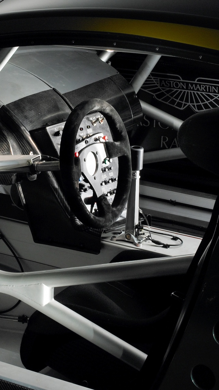 Обои Астон Мартин dbr9, Астон Мартин, суперкар, рулевое колесо, Астон Мартин дбс в разрешении 720x1280