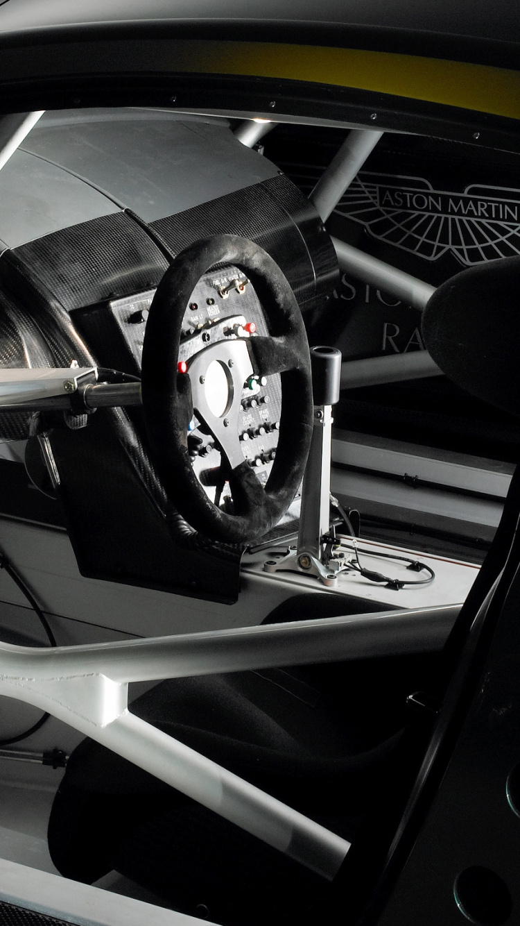 Обои Астон Мартин dbr9, Астон Мартин, суперкар, рулевое колесо, Астон Мартин дбс в разрешении 750x1334