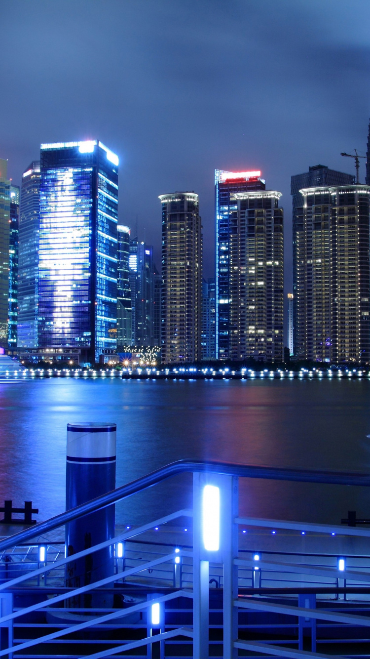 Обои телевизор, город, городской пейзаж, метрополия, линия горизонта в разрешении 750x1334