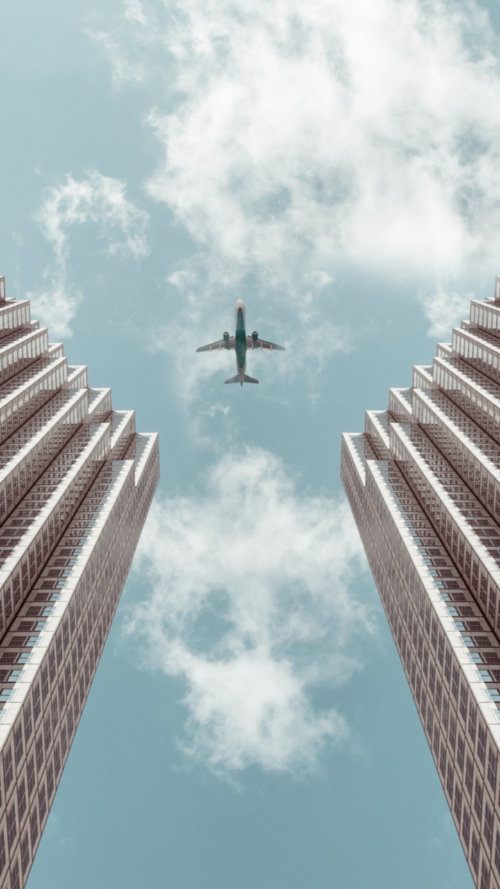 Обои Черви-глаза, перспектива, дневное время, небоскреб, архитектура в разрешении 720x1280