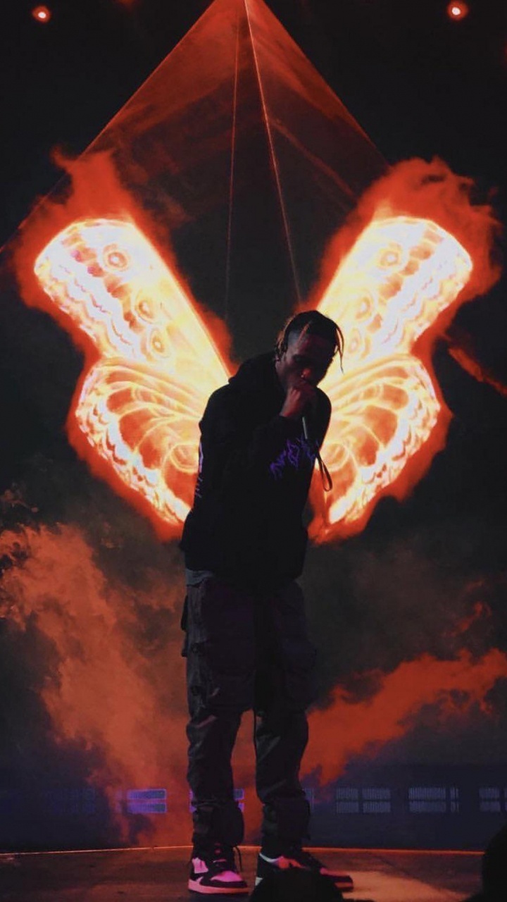 Обои Трэвис Скотт, кактус куртка, свет, Апельсин, освещение в разрешении 720x1280