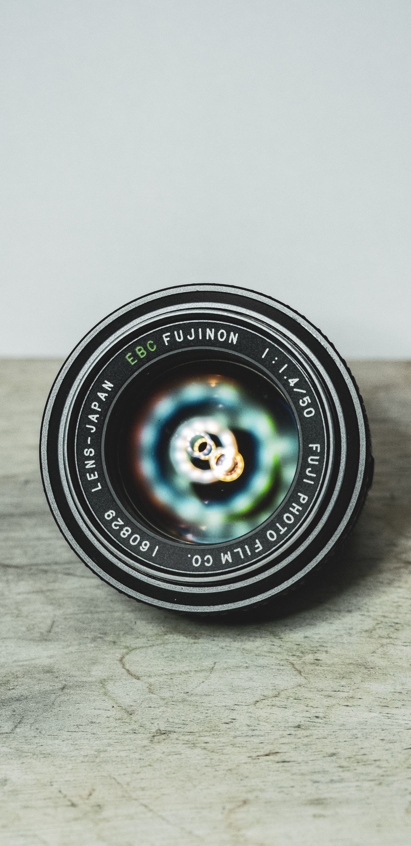 Обои объектив камеры, камера, объектив, зеленый, круг в разрешении 1440x2960