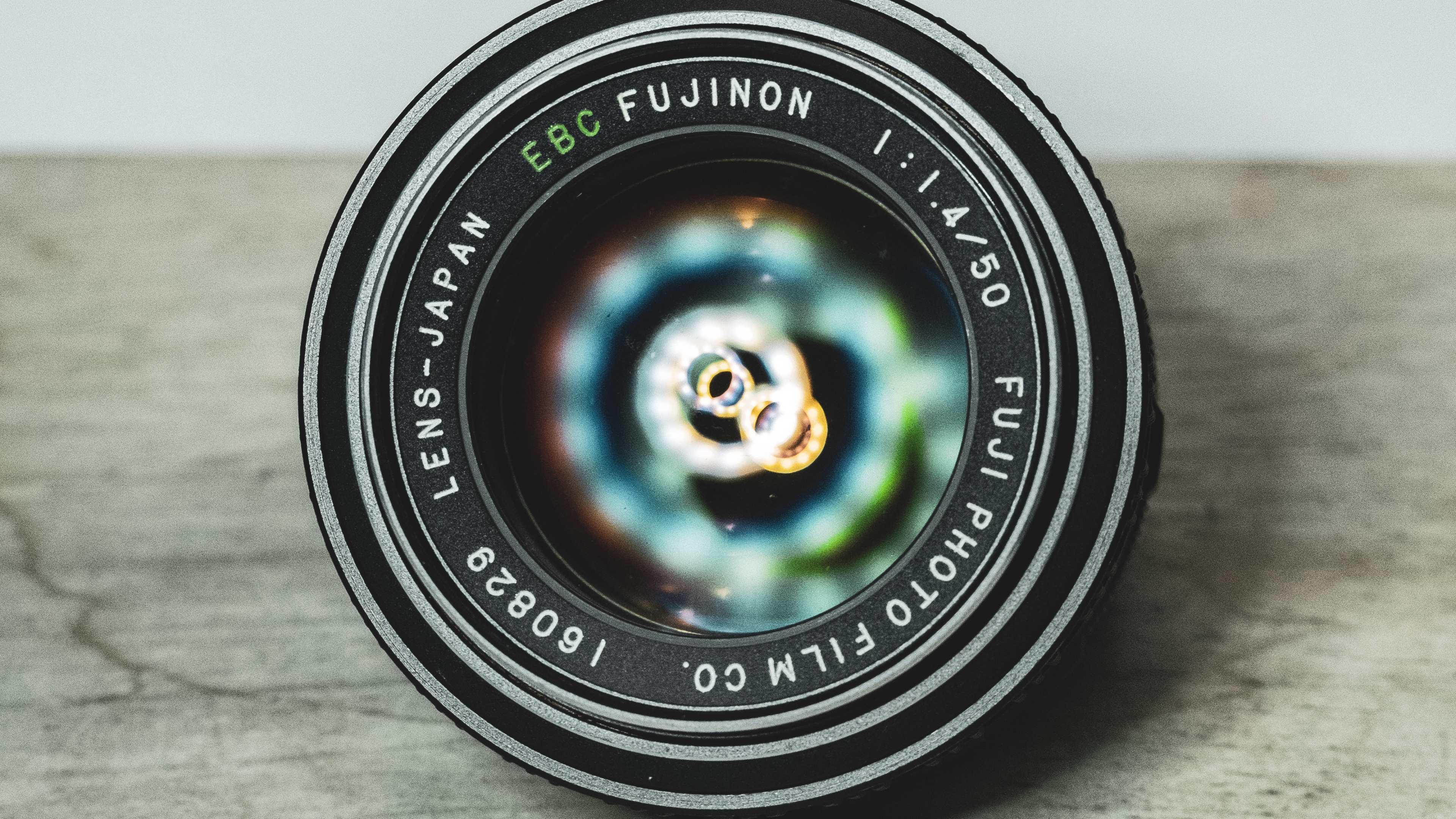 Обои объектив камеры, камера, объектив, зеленый, круг в разрешении 3840x2160