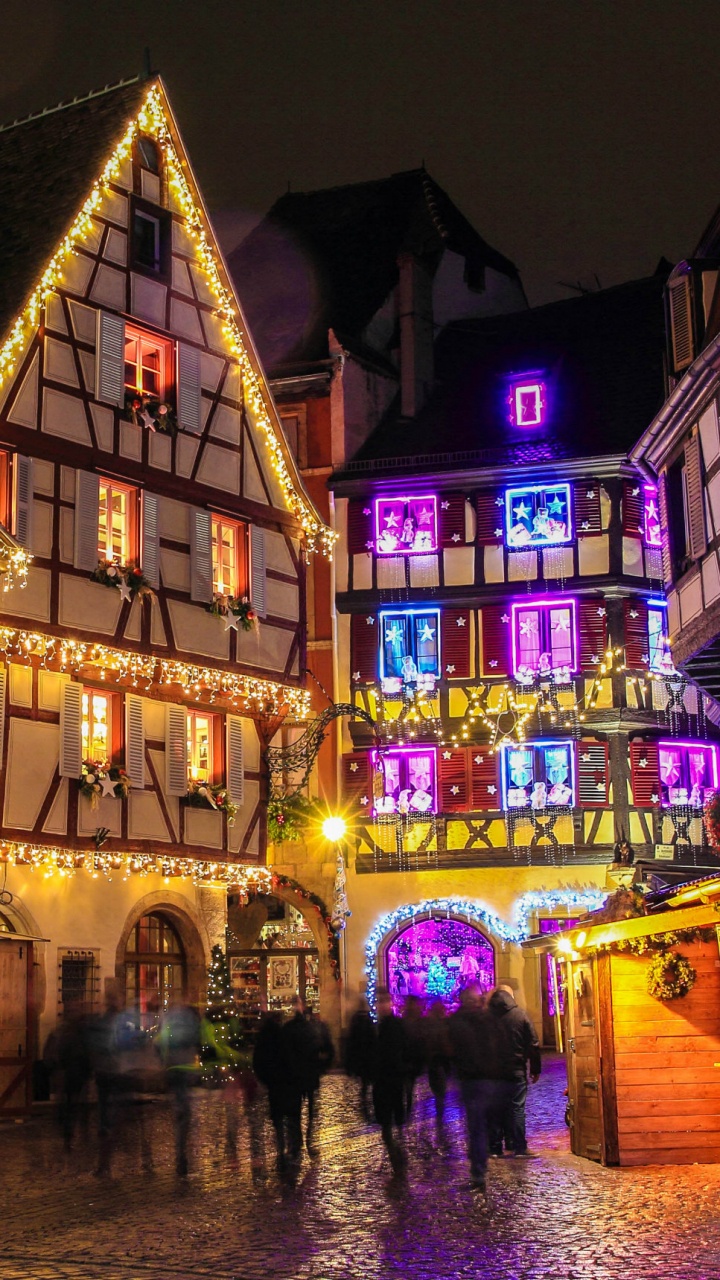 Обои Christkindelsmrik Страсбург, Рождественский рынок, Рождественский день, ночь, городок в разрешении 720x1280