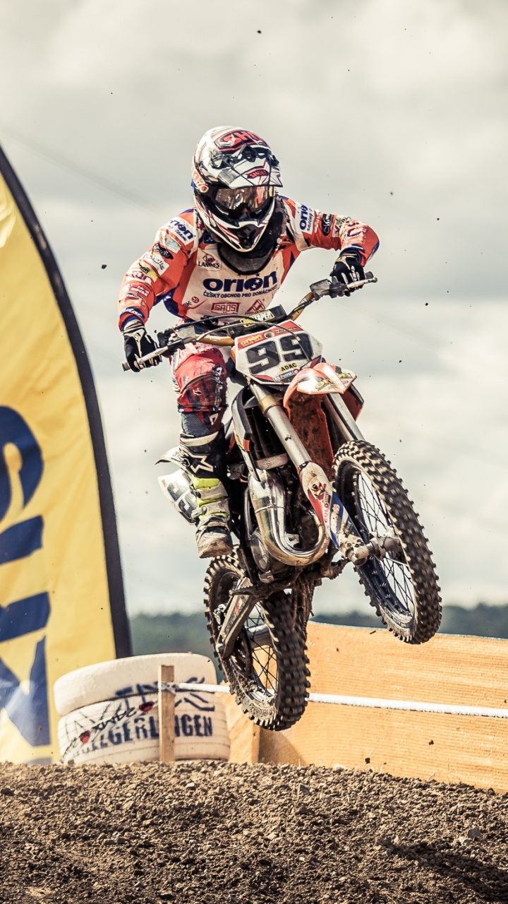 Обои Фристайл мотокросс, мотокросс, гоночный, экстремальный вид спорта, гонки на мотоциклах в разрешении 720x1280